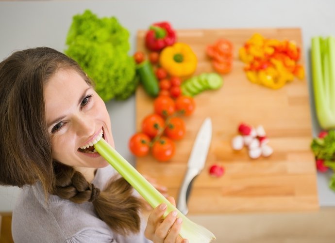 image of a healthy mouth eating celery